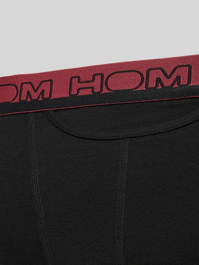 Produktfoto, Slim Fit Trunks mit Logo-Stitching Modell 'Terry' im 2er-Pack von HOM aus elastischem Baumwoll-Mix in Schwarz mit rotem Elastischer-Logo-Bund und sichtbaren Nähten