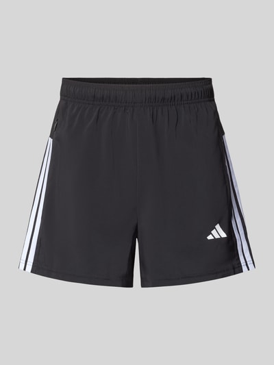 Produktfoto, Shorts mit Logo-Print und Reißverschlusstaschen von adidas Training in Schwarz mit weißen Details, Lockerer-Schnitt, Elastischer-Bund, seitliche Reißverschlusstaschen, Bundweite 38 cm, Innenbeinlänge 14 cm, für Herren