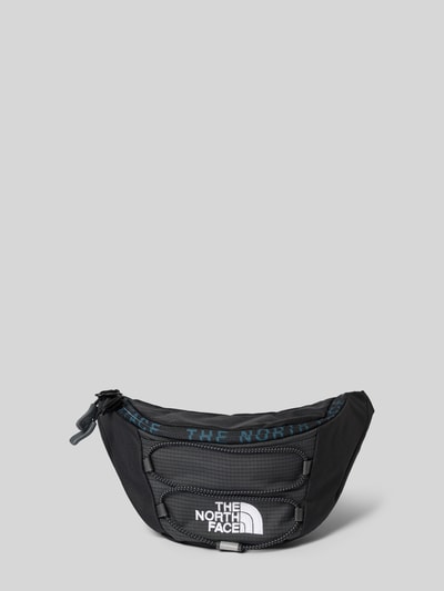 Produktfoto, schwarze Bauchtasche mit Logo-Print Modell 'Jester' von The North Face, Reißverschluss, verstellbarer Schulterriemen, strukturierte Oberfläche, Maße 27x16x9 cm, Kontext: Herren Bauchtasche, Vorderansicht