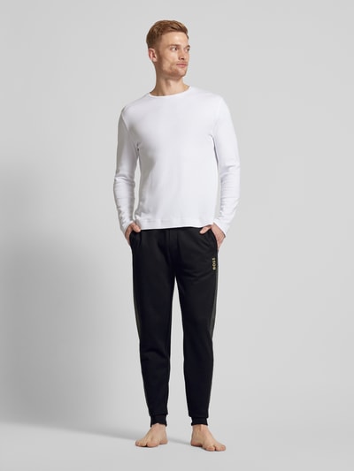 BOSS Tapered fit sweatpants met tunnelkoord, model 'Tracksuit' Zwart - 1