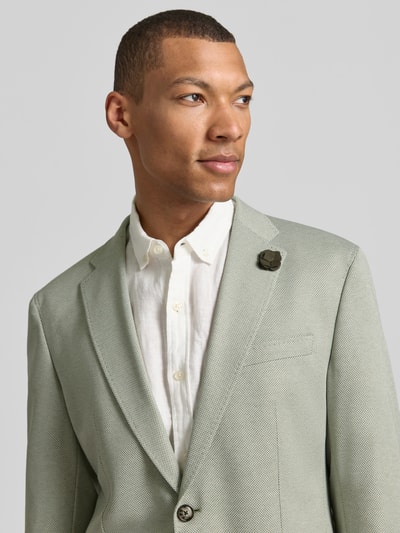Männermodel trägt Sakko mit floraler Applikation Modell 'Hoverest' von JOOP! Collection, Viskose-Mix, Regular-Fit, Nahaufnahme Oberkörper.