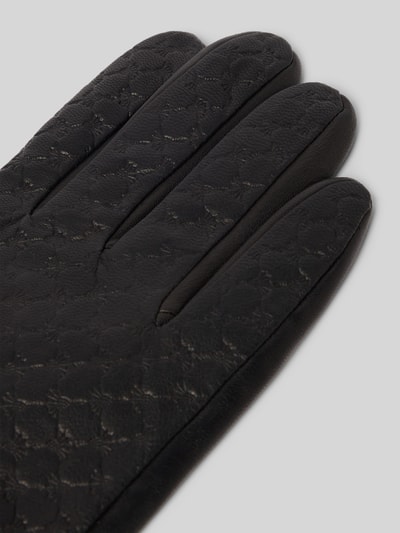 Produktfoto, Handschuhe aus Ziegenleder mit Riemen und Druckknopfverschluss von JOOP! Collection, schwarzes Ziegenleder, Fingerhandschuhe, sichtbare Nähte, feine Textur