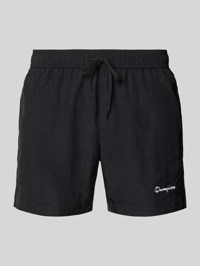 Produktfoto, schwarze Badehose mit elastischem Bund und Label-Stitching von CHAMPION, Regular-Fit, Tunnelzug, leichte Struktur