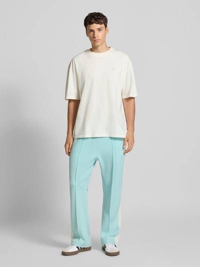 KARL KANI Flared Sweatpants mit elastischem Bund Ocean 1