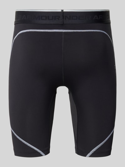 Produktfoto, Radlerhose mit elastischem Bund und Label-Details von Under Armour aus schwarzem Material-Mix mit Stretch-Anteil, körpernahe Passform, Modell 'Elite', Bundweite bei Größe M 36 cm, Innenbeinlänge 20 cm, feine Kontrastnähte.