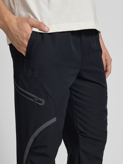 Under Armour Relaxed Fit Trainingshose mit Cargotaschen Modell 'Unstoppable' Black 3