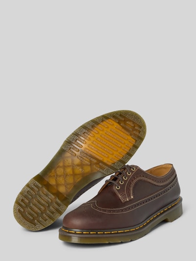 Produktfoto, Schnürschuhe aus echtem Leder von Dr. Martens, brązowy kolor, zaokrąglony krój, wiązanie, profilowana podeszwa, wysokość obcasa 3 cm, wysokość cholewki 7 cm, szerokość w rozmiarze 44: 11 cm