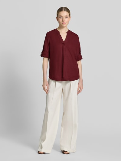 Vrouwenmodel draagt Relaxed Fit Tunika aus Leinen-Viskose-Mix von s.Oliver RED LABEL, look: effen kleuren, mix van linnen en viscose, tuniekkraag, achterpas met cacharelplooi, V-hals, 3/4-mouw met turn-up-optie, manchet, Ganzkörperansicht van voren.