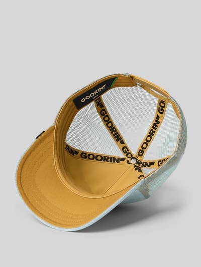 Produktfoto, Trucker Cap mit Stitching Modell 'Denim Eagle' von GOORIN BROS., mieszanka materiałów z domieszką bawełny, wzmacniany daszek, regulowana długość, denim, żółte i niebieskie elementy, tekstura siateczki