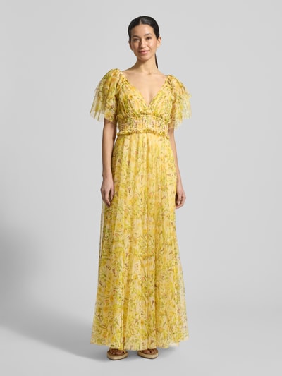 Kobiece modelka nosi 'Abendkleid aus Tüll mit V-Ausschnitt' od Lace & Beads, tiul, taliowany krój, długa sukienka, tasiemka w talii, długość tyłu w rozmiarze S: 120 cm, szerokość w rozmiarze S: 132 cm, żółte kwiatowe wzory, pełny widok z przodu.