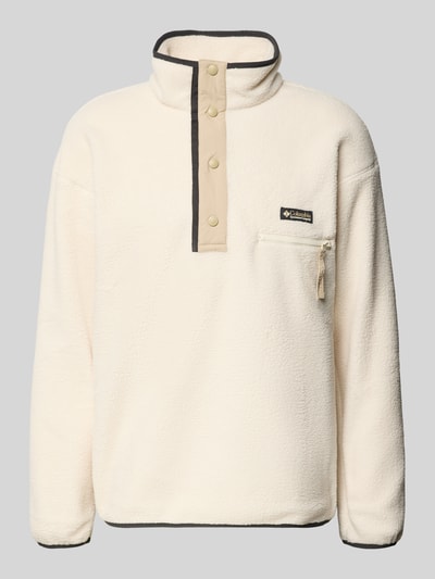 Produktfoto, Fleecepullover mit Stehkragen und Knopfleiste von Columbia, krój regular fit, stójka, listwa guzikowa, wyhaftowane logo, kieszeń zapinana na zamek błyskawiczny, długość tyłu w rozmiarze M: 73 cm, długość rękawów w rozmiarze M: 70 cm, kremowy kolor, miękka tekstura.