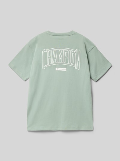 Produktfoto, T-Shirt mit Label-Print und Rundhalsausschnitt von CHAMPION in Hellgrün, reine Baumwolle, Regular Fit, glatte Textur, Rückansicht.