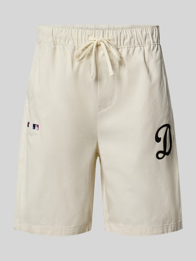 Produktfoto, Relaxed Fit Shorts aus reiner Baumwolle von Champion in Beige mit elastischem Bund, Tunnelzug und Logo-Stitching, Struktur glatt