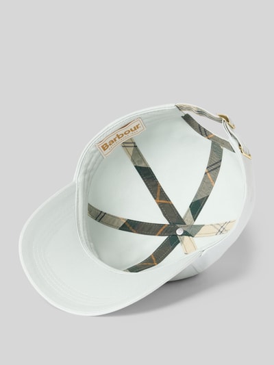 Produktfoto, Basecap aus reiner Baumwolle Modell 'Olivia' von Barbour in Unifarbe mit Label-Schriftzug, verstellbarem Riegel und verstärktem Schirm, helles Material mit gemusterten Innennähten.