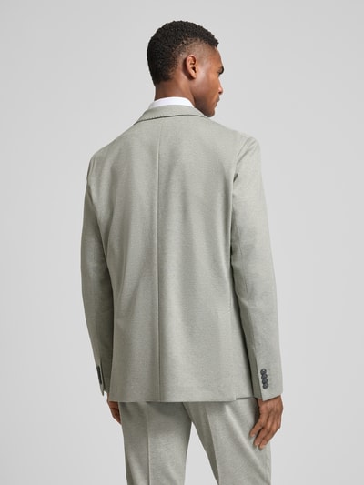 Męski model nosi Slim Fit Anzug mit steigendem Revers od Roy Robson, szary, tekstura gładka, widok całej sylwetki z tyłu.
Kontekst: garnitur męski, mieszanka wiskozy, krój slim fit, zdobienia, kołnierz z klapami, rosnące klapy, kieszeń na piersi, kieszenie z patkami, zapięcie na dwa guziki, szerokość w rozmiarze 50: 44 cm, długość pleców w rozmiarze 50: 71 cm, szerokość ramion w rozmiarze 50: 44 cm, długość rękawa w rozmiarze 50: 65 cm, długość wewnętrzna nogawki w rozmiarze 50: 79 cm.