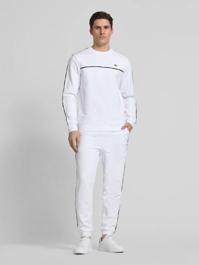 Lacoste Loose fit sweatpants van puur katoen, model 'TAPE' Wit - 1