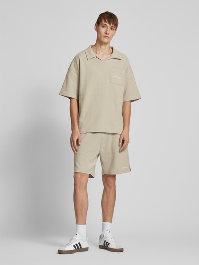 ANOTHER COTTON LAB Oversized Poloshirt mit V-Ausschnitt Offwhite 1