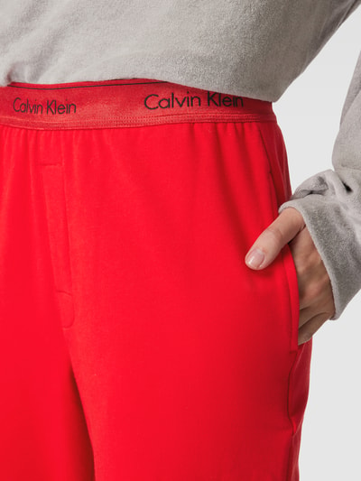 Calvin Klein Underwear Spodnie dresowe z elastycznym paskiem z logo model ‘HOLIDAY’ Czerwony 3