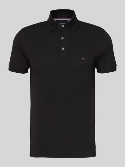 Produktfoto, zwart Slim Fit Poloshirt met Stretch-Anteil van Tommy Hilfiger, korte knoopsluiting, logo borduursel, katoenen-elastaan mix.