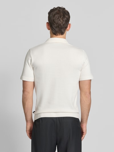Männermodel trägt Regular Fit Poloshirt mit Reißverschluss Modell 'MILANO' von Jack & Jones Premium, cremefarben, Rückenansicht, Bio-Baumwoll-Mix