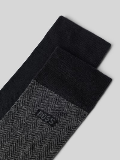Produktfoto, Strümpfe aus Baumwoll-Mix im 2er-Pack von BOSS, unifarben und in Fischgrätenoptik mit Label-Schriftzug, elastischer Bund