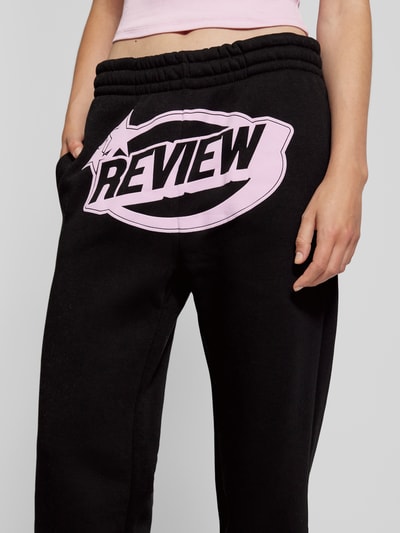 Review Regular fit sweatpants met labelprint Zwart - 3