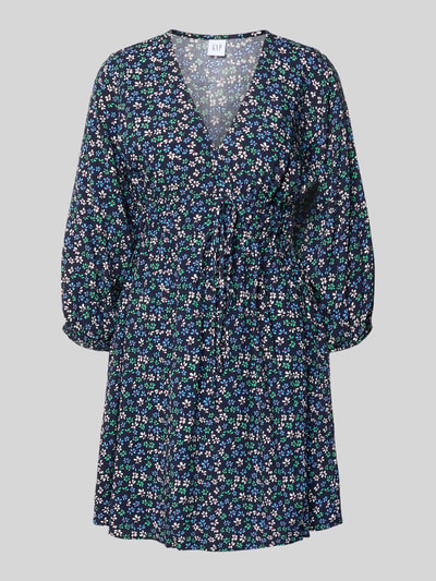 Produktfoto, 'Minikleid aus reiner Viskose mit floralem Allover-Print' van GAP in donkerblauw met heldere all-over bloemenprint, getailleerd, V-hals, 3/4-mouw, ruglengte maat S 86 cm, borstwijdte 52 cm, mouwlengte 42 cm, zachte structuur