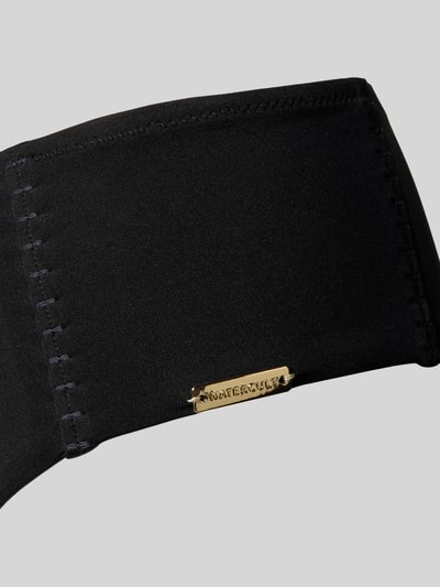 Produktfoto, Bikinihose mit elastischem Bund und Label-Detail von WATERCULT, schwarzer Material-Mix mit Stretch-Anteil, glatte Textur, körpernahe Passform