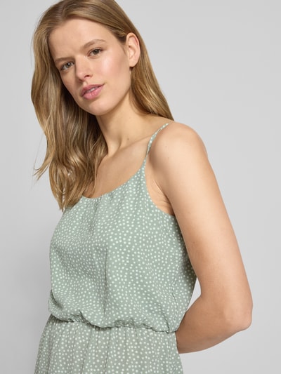 Frauenmodel trägt Maxikleid aus Crêpe Modell 'WINNER LIFE' von Only, florales Allover-Muster, tailliert, Rundhals, verstellbare Spaghettiträger, elastisches Taillenband, Optik: Allover-Muster, Materialverarbeitung: Crêpe, Nahaufnahme Oberkörper.
