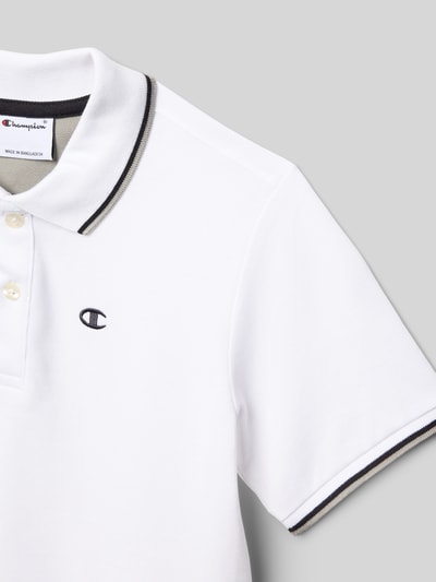 Produktfoto, Poloshirt mit Logo-Stitching und kurzer Knopfleiste von CHAMPION aus reiner Baumwolle, krój regular fit, polokragan, krótka listwa guzikowa, logo na piersi, długość pleców w rozmiarze 140: 49 cm, białe z czarnymi detalami, tekstura gładka