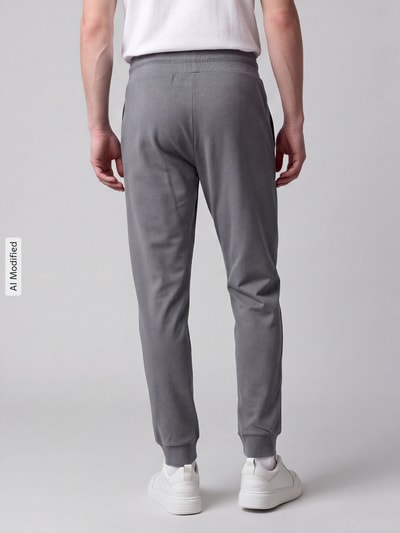 HUGO Spodnie dresowe w kroju regular fit z mieszanki bawełny model 'Laze Pants CW' Średnioszary 5