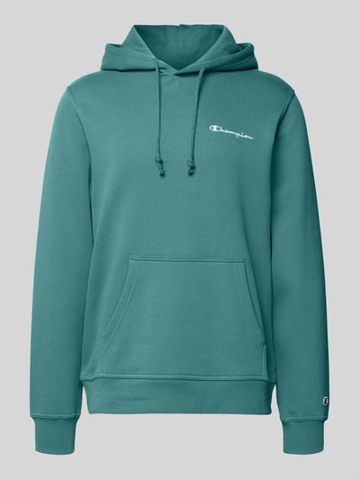 Produktfoto, Hoodie mit Kapuze von CHAMPION in Türkis, Baumwoll-Mix, Lockerer-Schnitt, Känguru-Tasche, Label-Stitching, gerippte Abschlüsse.