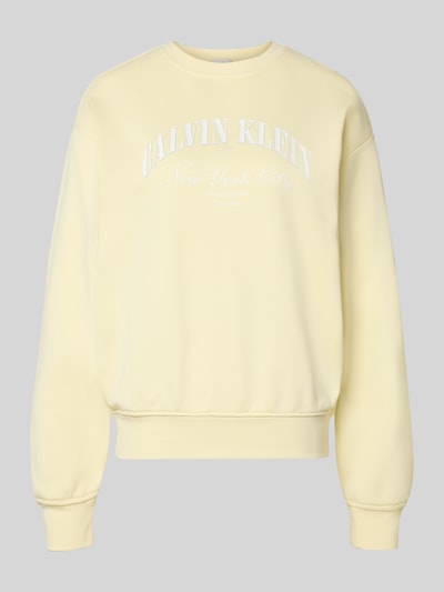 Produktfoto, Sweatshirt mit Label-Print Modell 'GRAPHIC' von Calvin Klein Jeans in hellem Gelb, Rundhalsausschnitt, lockere Passform, Baumwoll-Elasthan-Mix, elastische Abschlüsse, glatte Struktur