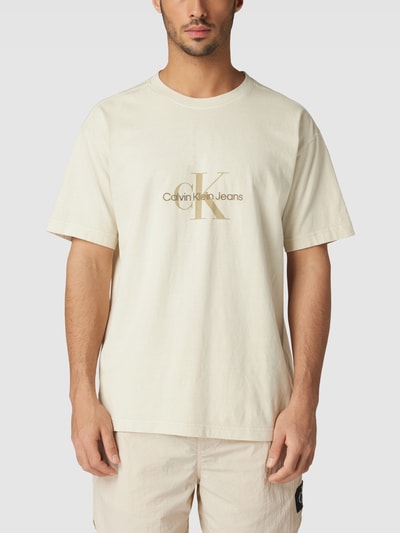 Calvin Klein Jeans T-shirt z obniżonymi ramionami model ‘MONOLOGO’ Piaskowy 4
