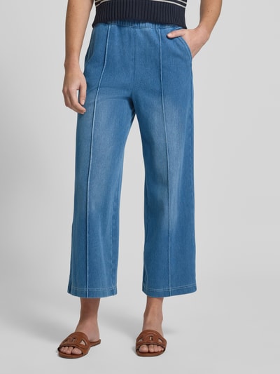 Vrouwenmodel draagt Jeans im Used-Look mit Längsnähten van Zero, blauwe denim, wijde pijpen, katoenmengsel met stretch, detailopname vooraan.