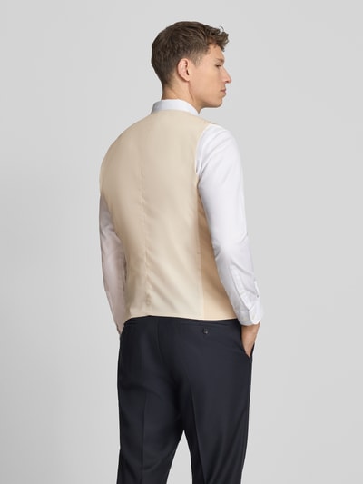 Männermodel trägt Slim Fit Anzugweste mit Woll-Anteil Modell 'NEIL' von SELECTED HOMME, Optik: Unifarben, Ganzkörperansicht Rückansicht.
