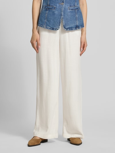 Frauenmodel trägt Loose Fit Weite Hose aus Viskose-Leinen-Mix Modell 'SIESTA' von Only in Two-Tone-Optik, Flammgarn-Material, mit Tunnelzug, elastischem Bundabschluss und seitlichen Eingrifftaschen, Ganzkörperansicht von vorne.