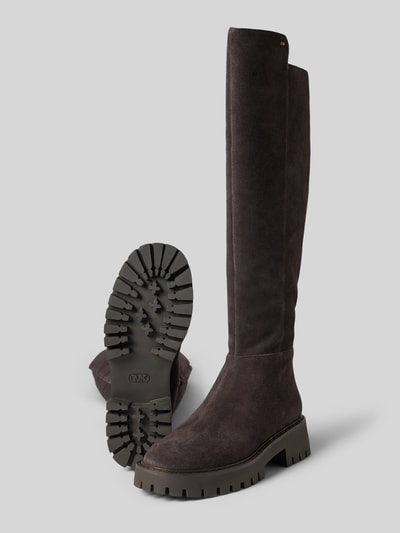 Productfoto, Stiefel aus echtem Leder Modell 'ASHER' van MICHAEL Michael Kors in donkerbruin suède, geprofileerde zool, afgerond model, asymmetrische schacht, ritssluiting aan de zijkant, hakhoogte maat 40: 5 cm, schachthoogte 47 cm, schachtbreedte 20 cm.