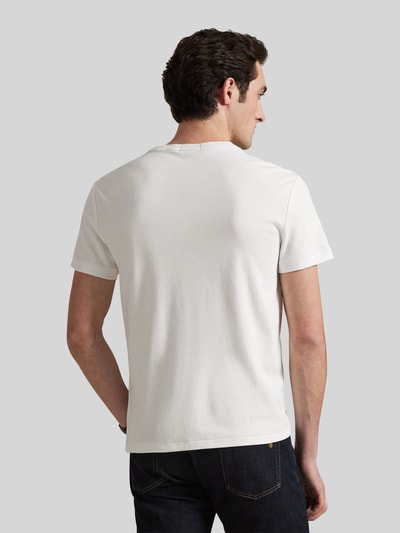 Męski model nosi Slim Fit T-Shirt aus reiner Baumwolle von Polo Ralph Lauren, efekt: jednolity kolor, krój slim fit, wyhaftowane logo, okrągły dekolt, krótki rękaw, bawełna, Ganzkörperansicht Rückansicht