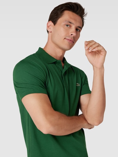 Lacoste Koszulka polo o kroju regular fit z bawełny z detalem z logo Butelkowy zielony 3