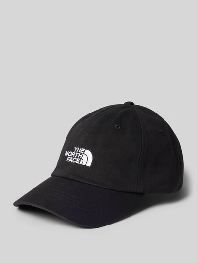 Produktfoto, schwarze Base Cap aus Baumwoll-Mix Modell 'Norm' von The North Face mit weißem Logo-Stitching und Strapback Verschluss.