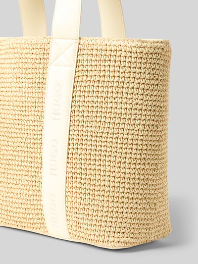 Produktfoto, Henkeltasche in Bast-Optik Modell 'BECKY' von HUGO aus beigefarbener Webware mit Tragehenkeln, Label-Tape und klarer Bast-Struktur
