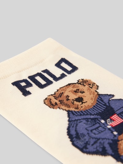 Produktfoto, Socken mit Motiv von Polo Ralph Lauren z mieszanki bawełny, dopasowany krój, motyw, elastyczny pas, kremowe tło, tekstura dzianiny