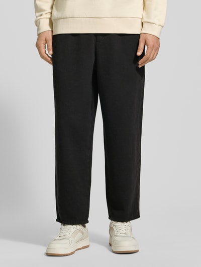 Männermodel draagt Flared Sweatpants met tunnelkoord Model 'AFAZ' van American Vintage, puur katoen, flared cut, Heren, binnenbeenlengte maat M 69 cm, Ganzkörperansicht von vorne.