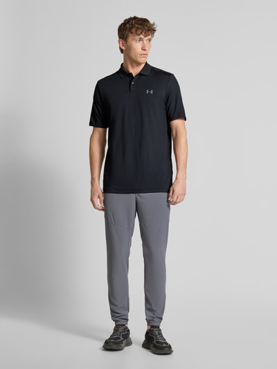 Under Armour Regular fit poloshirt met logo en knoopsluiting Zwart - 1