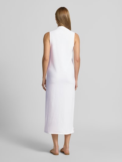 Frauenmodel trägt Figurumschmeichelndes Polokleid aus Baumwoll-Mix von Polo Ralph Lauren, Optik: Unifarben, Midi-Länge, Ganzkörperansicht Rückansicht.