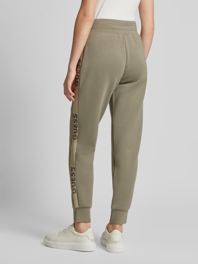 Guess Slim fit sweatpants met labelprints Olijfgroen - 5