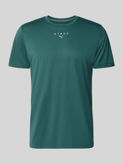 Produktfoto, Regular Fit Sport-T-Shirt mit Logo-Print Modell 'M PUMA X HYROX' von PUMA in Dunkelgrün, glatte Oberfläche, Herren Sport-T-Shirt von PUMA Performance