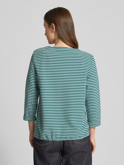 Vrouwenmodel draagt Regular Fit 3/4-Shirt uit bio-katoenmengsel van Tom Tailor, gestreept all-over patroon, tunnelkoord, ribstructuur, rugaanzicht volledige lichaamsopname.