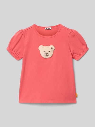 Produktfoto, T-Shirt mit Motiv-Stitching und Rundhalsausschnitt von Steiff, Kinder T-Shirt aus Baumwoll-Mix mit Stretch-Anteil, Gerader-Schnitt, Rundhalsausschnitt, Motiv-Stitching mit Label-Detail, elastische Ärmelabschlüsse, Rückenlänge bei Größe 116: 44 cm, in Rosa, glatte Textur, dezente Details.
